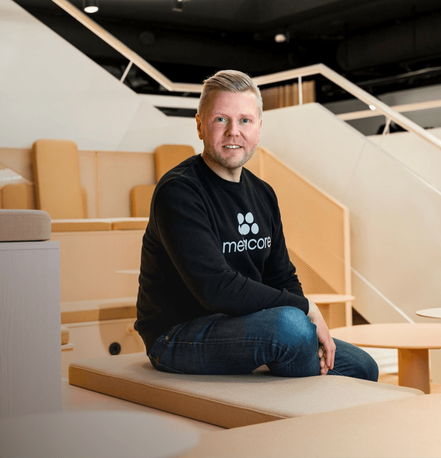 Metacorean sitting in auditorium