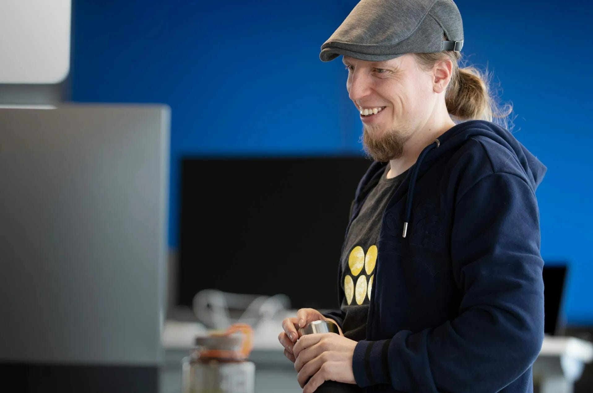 Happy person working at Metacore