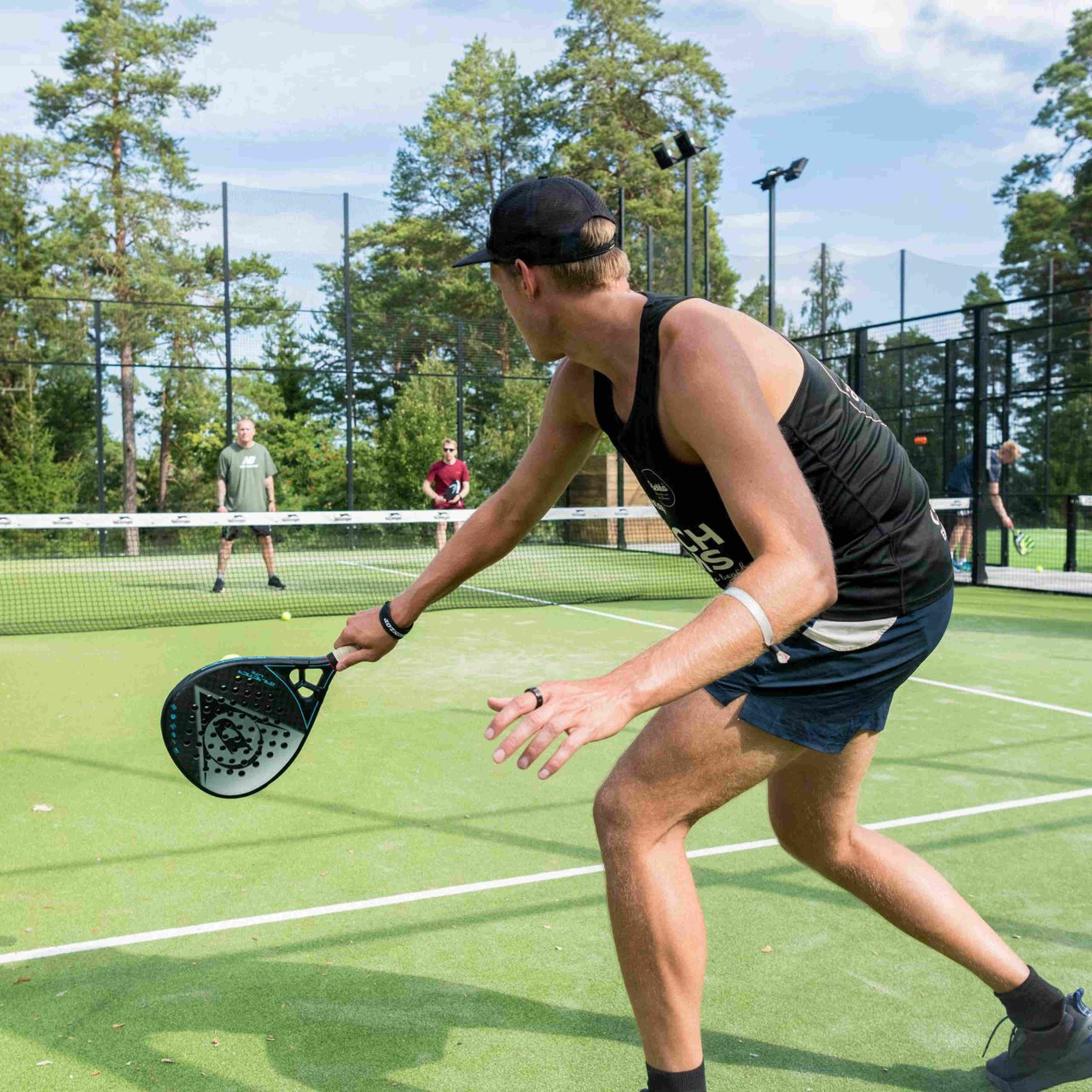 Metacoreans playing padel